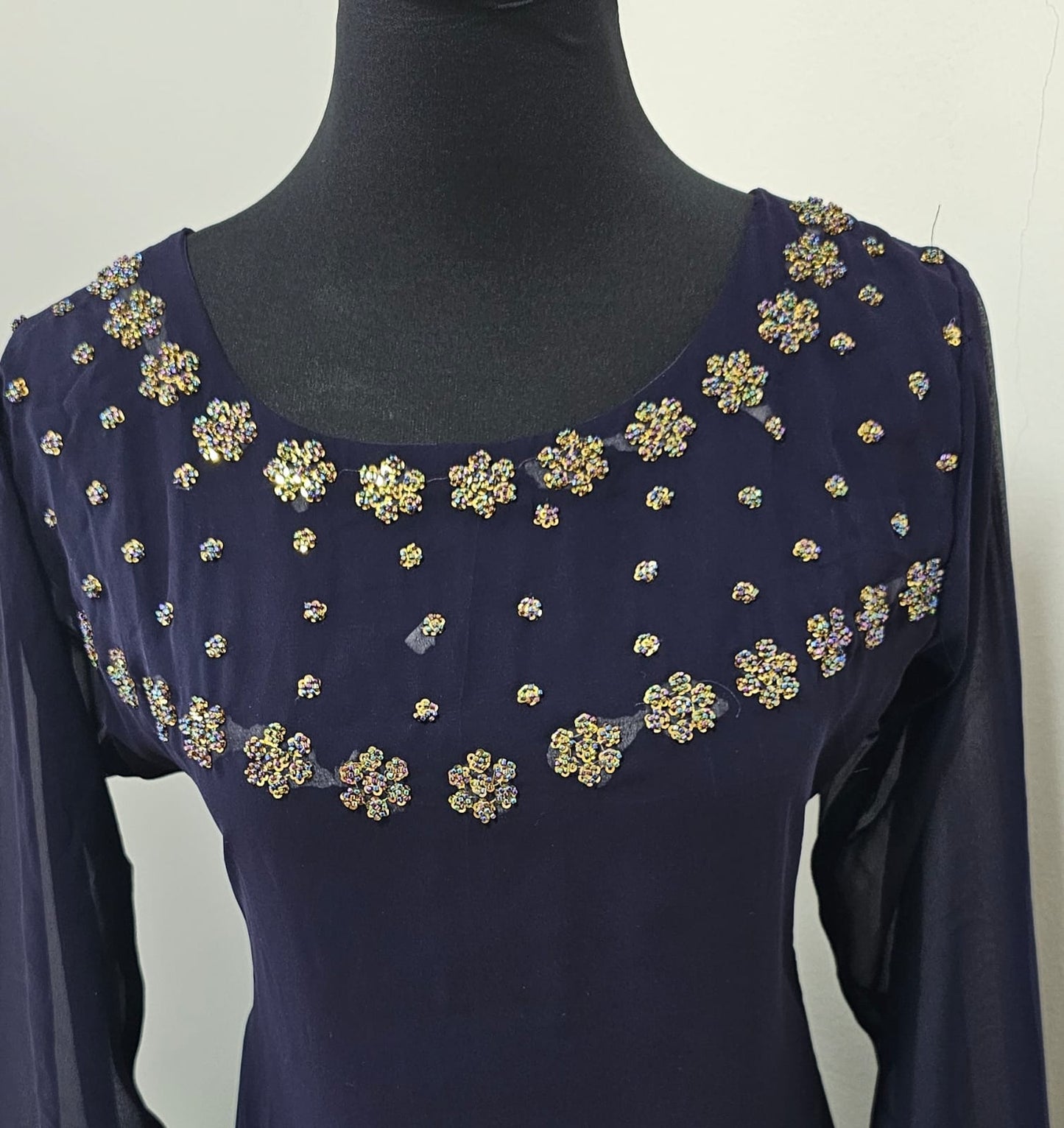 16FEB25.
Beautiful Georgette A line Top with Heavy Beads Work on the Yoke and Sleeves.