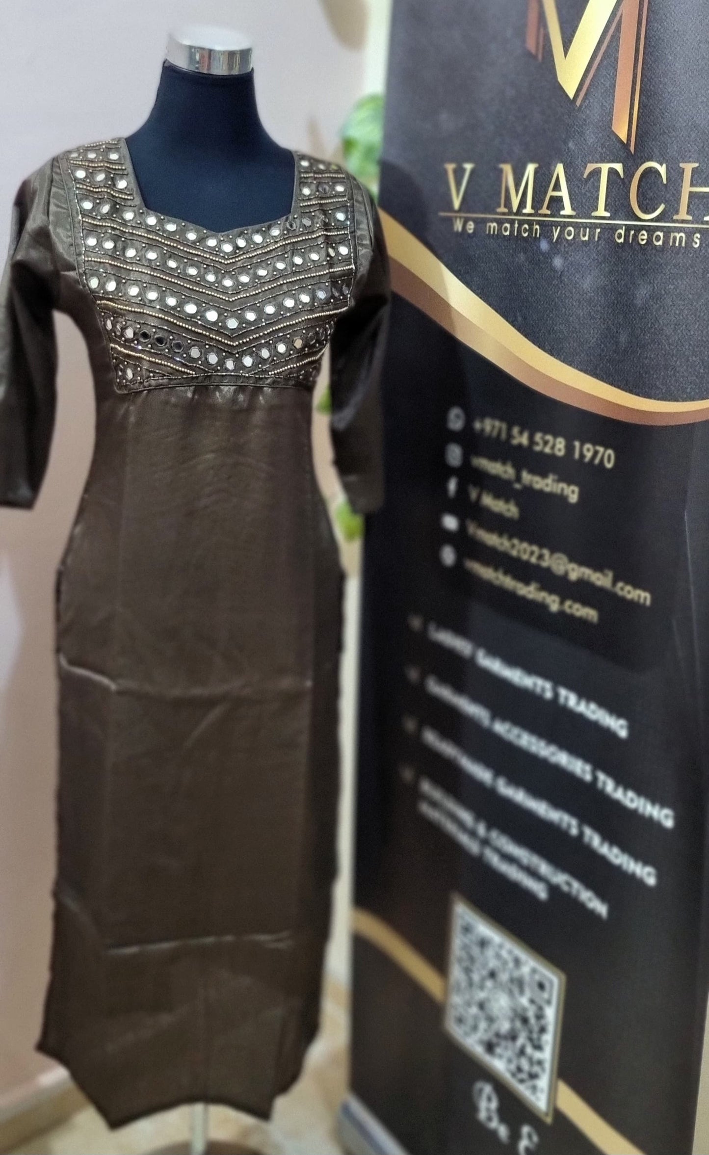 03APR25. Premium Semi Silk Slitted Top with Heavy Beads work and Mirror work on the Yoke.