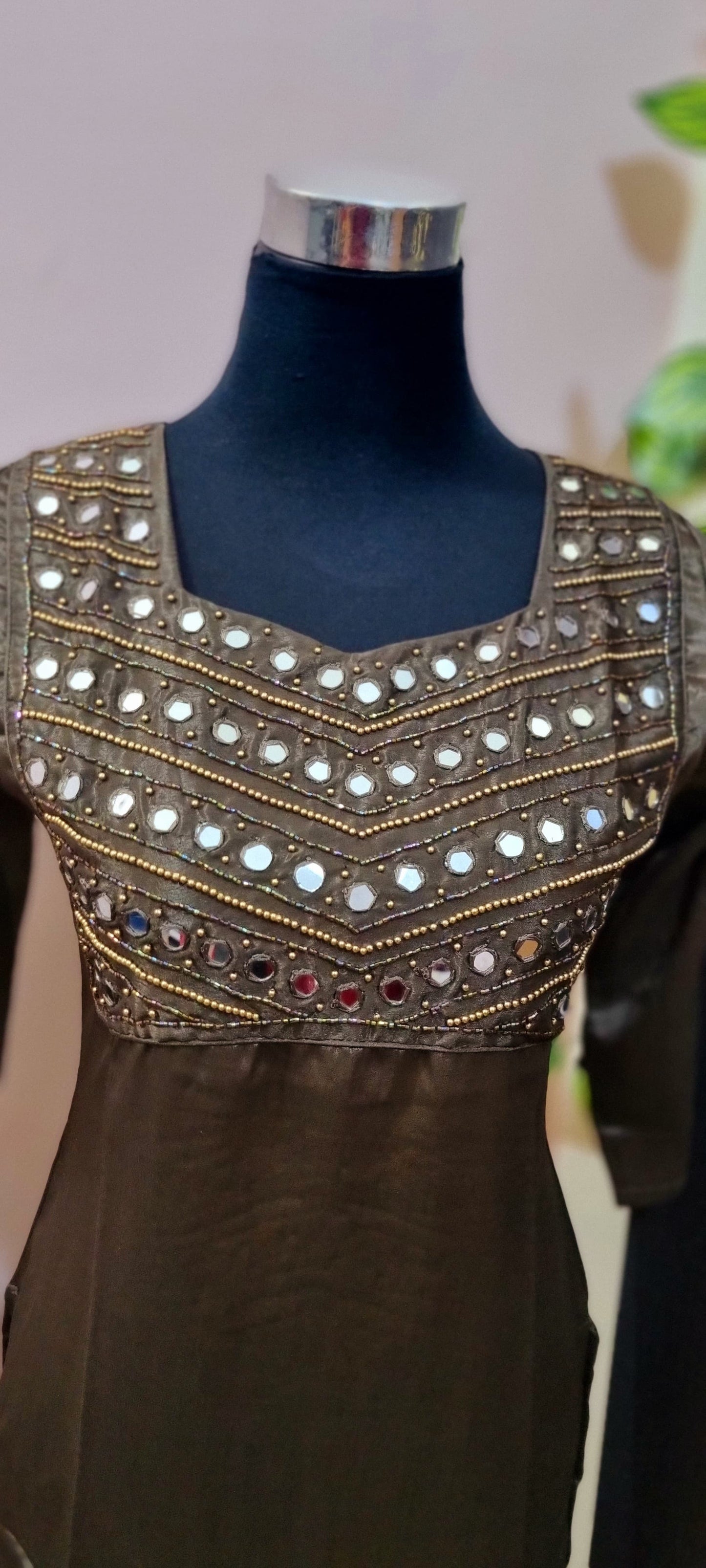 03APR25. Premium Semi Silk Slitted Top with Heavy Beads work and Mirror work on the Yoke.