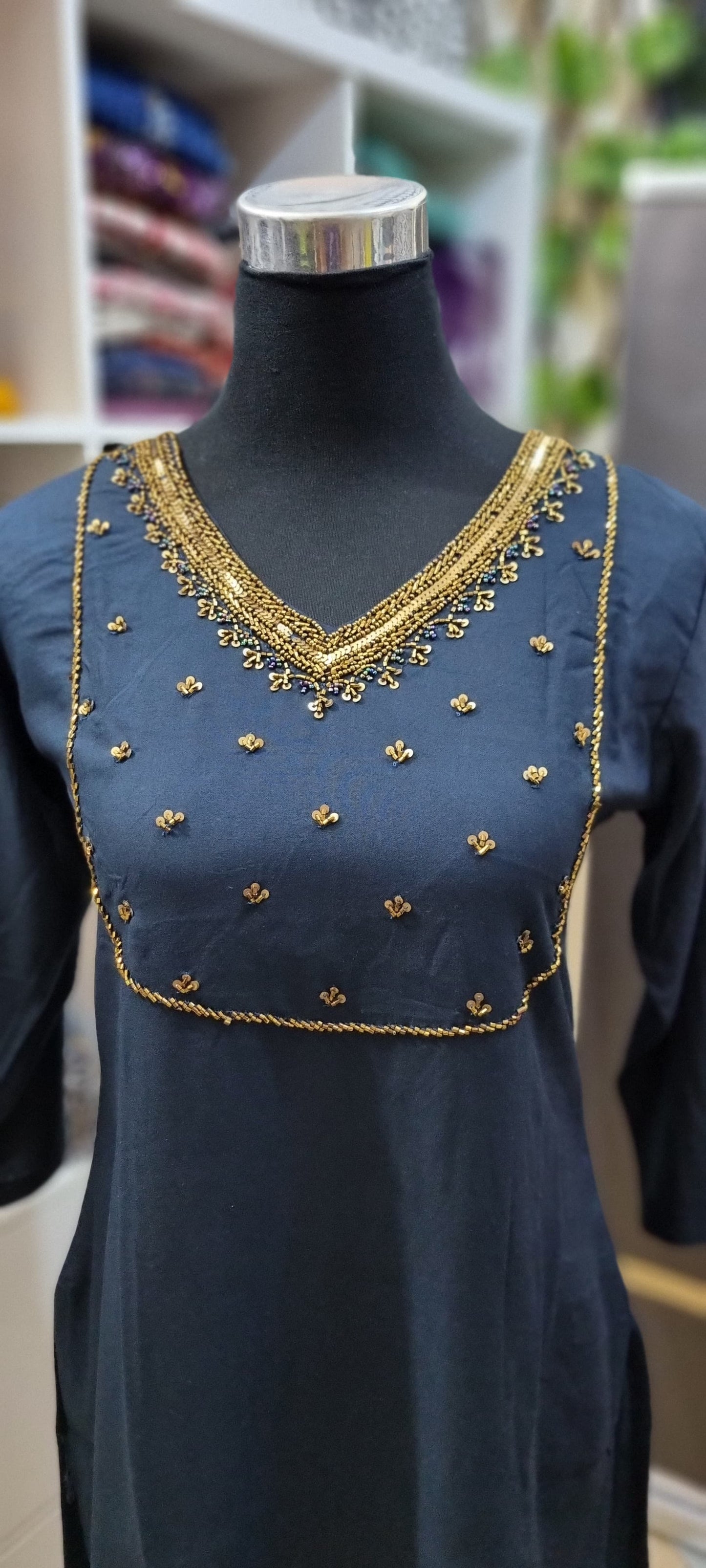 20MY25. Premium Rayon Partywear Slitted Top with Heavy Beads work on the Yoke