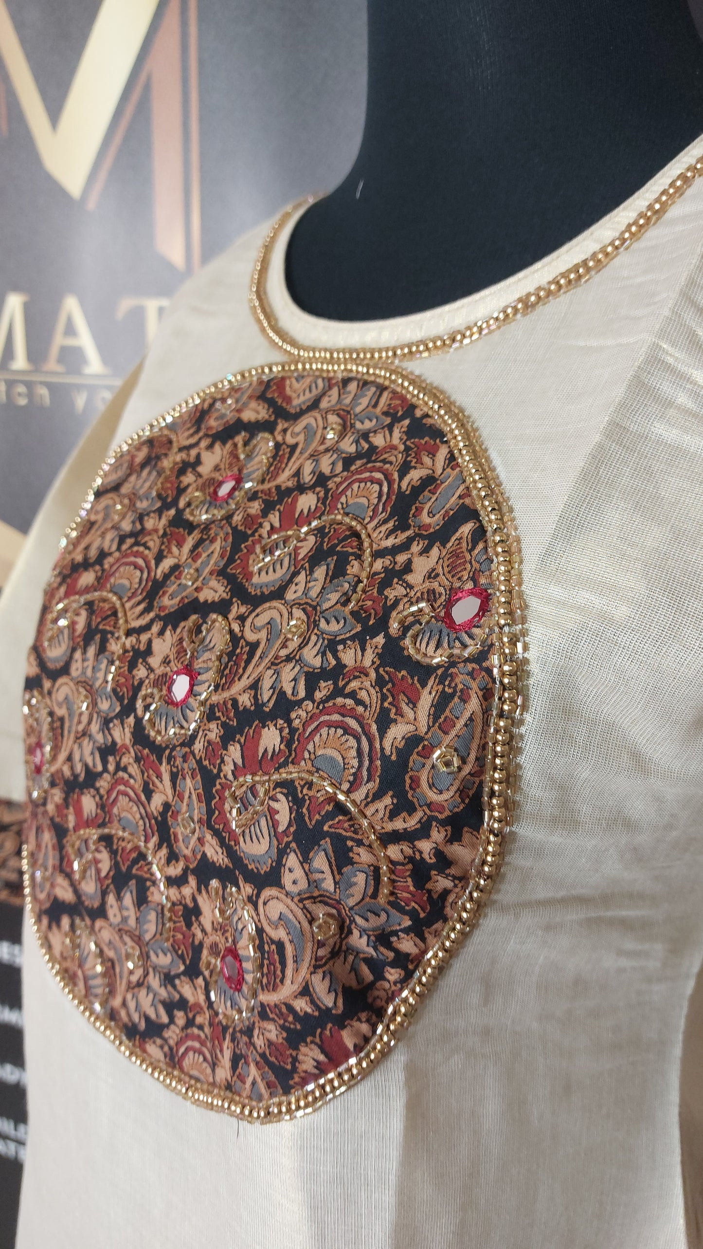 Code 1SP24.

Beautiful Soft tissue Slitted kurti with Kalamkari patch and bead work!!!