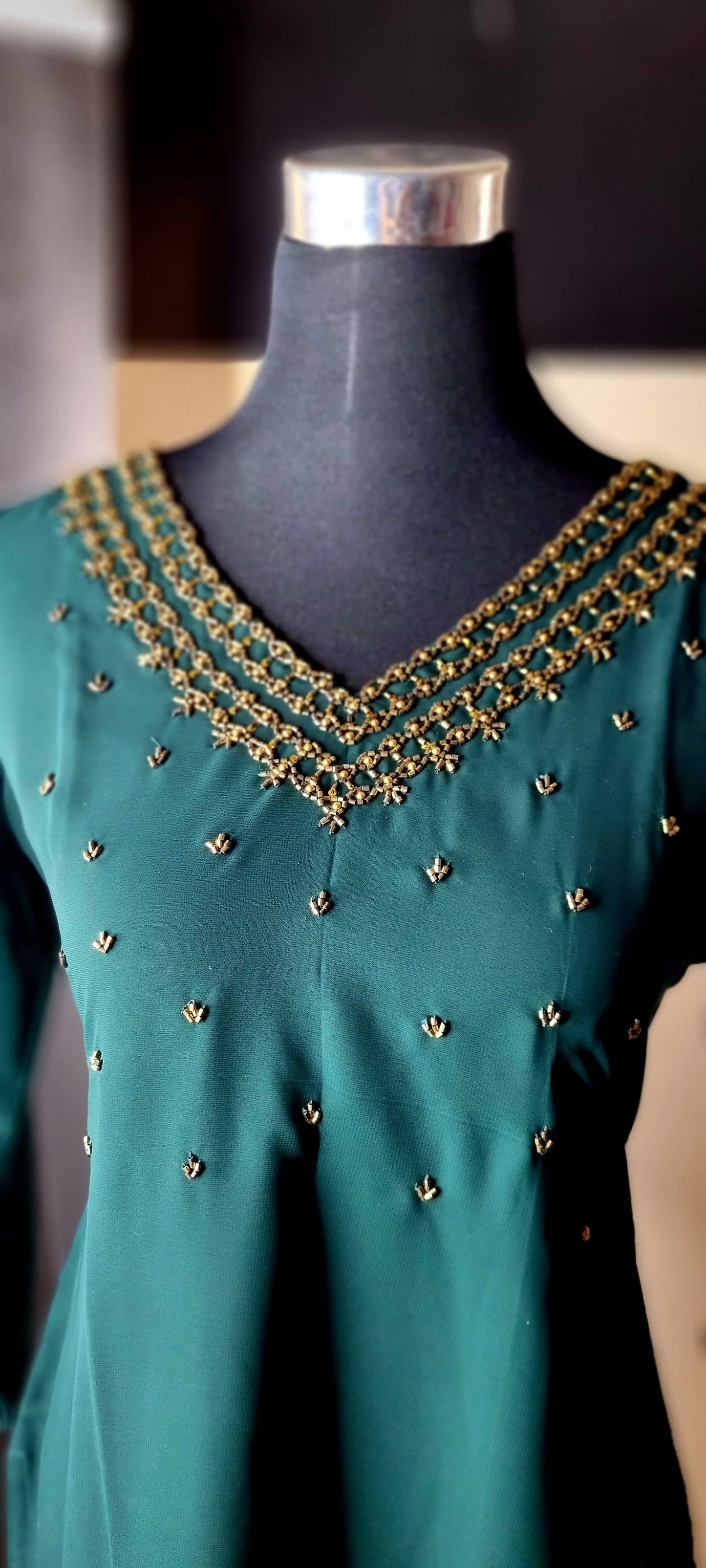 Code 16SP24.
Beautiful Georgette Slitted Top with heavy beads work on Yoke !!!