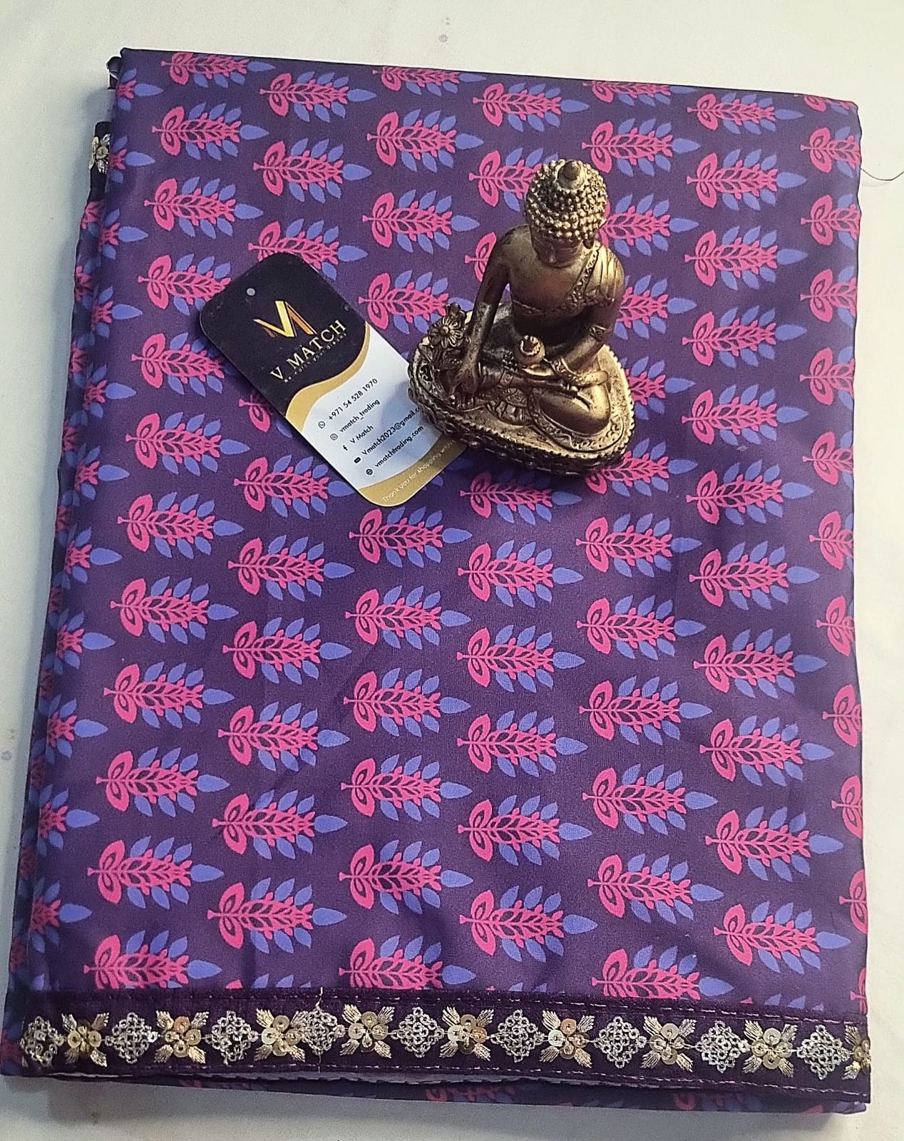 7SEP25.Floral Printed Purple Crepe Silk Saree with Delicate Sequins Border