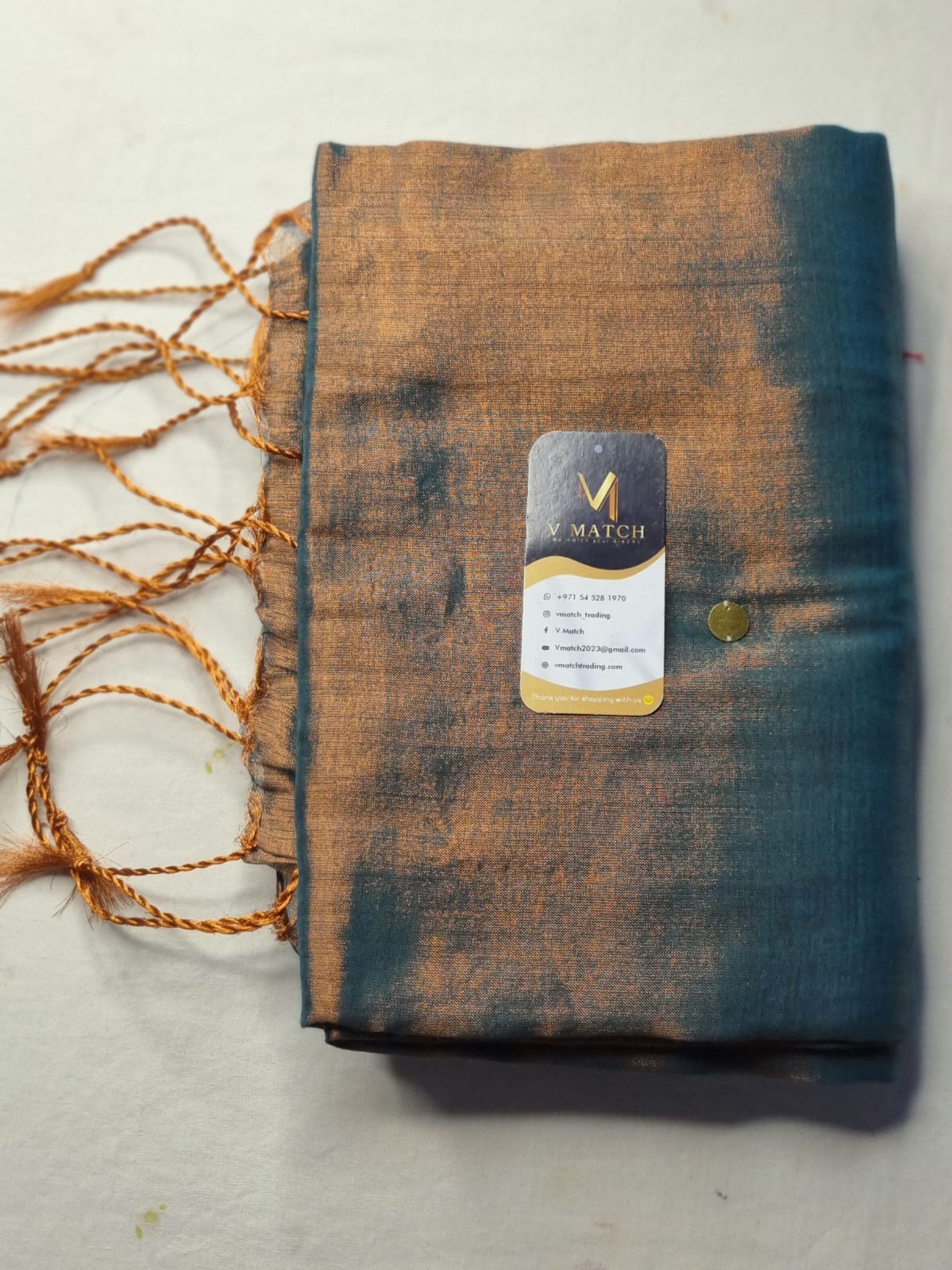 37SEP25. Patina Green Tissue by Tissue Saree with Tikki Work.