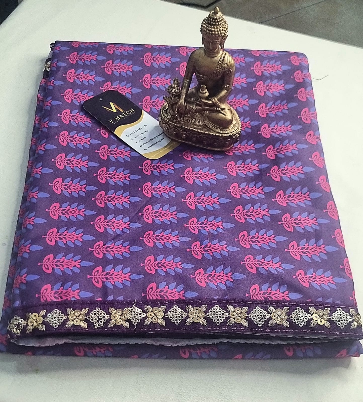 7SEP25.Floral Printed Purple Crepe Silk Saree with Delicate Sequins Border